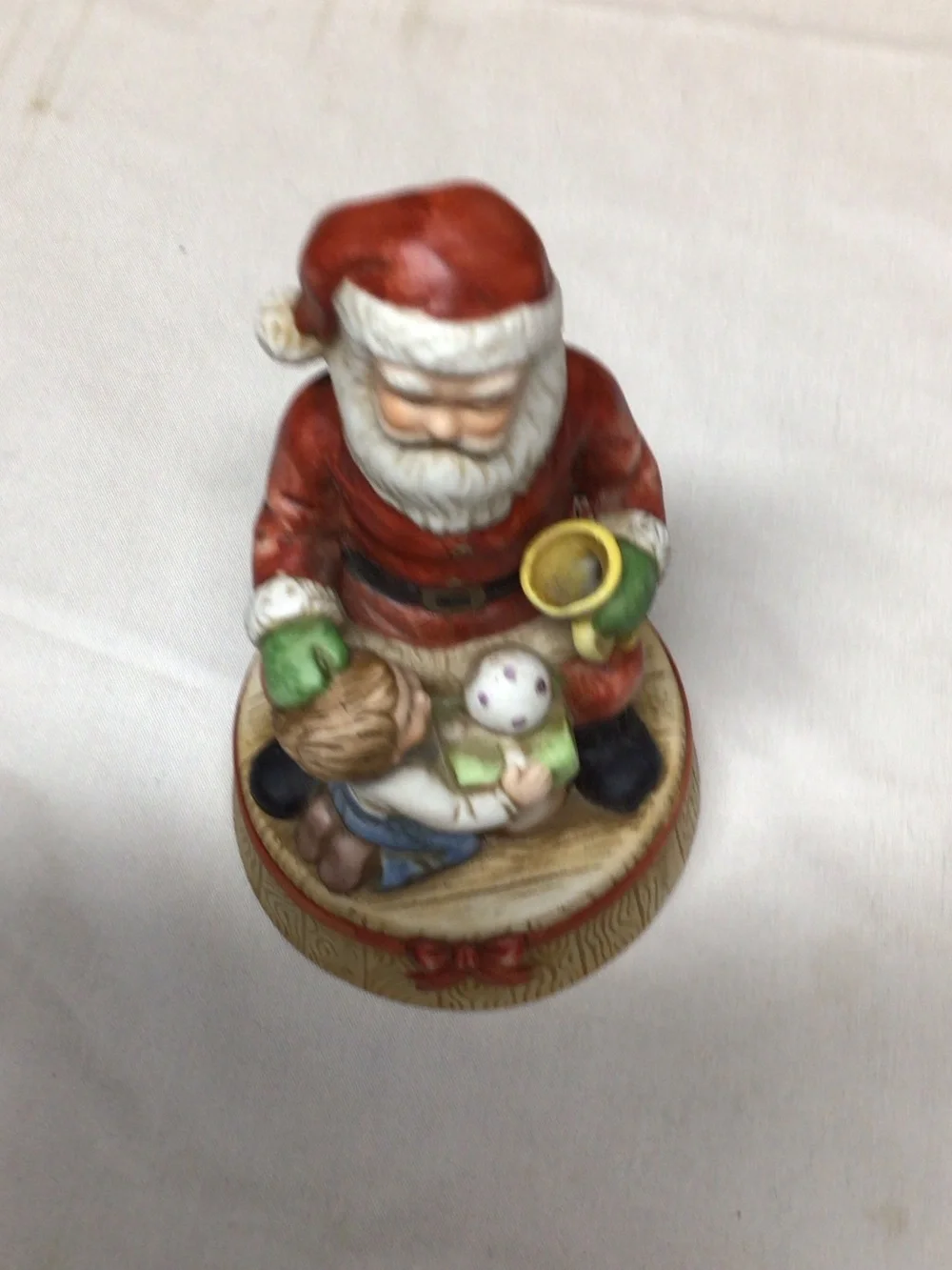 Santa Figurine Holiday Decoration in Red and White music box
